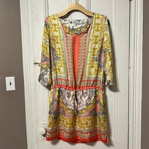 Beautiful lined short “ silk like” dress by Jennifer Lopez.